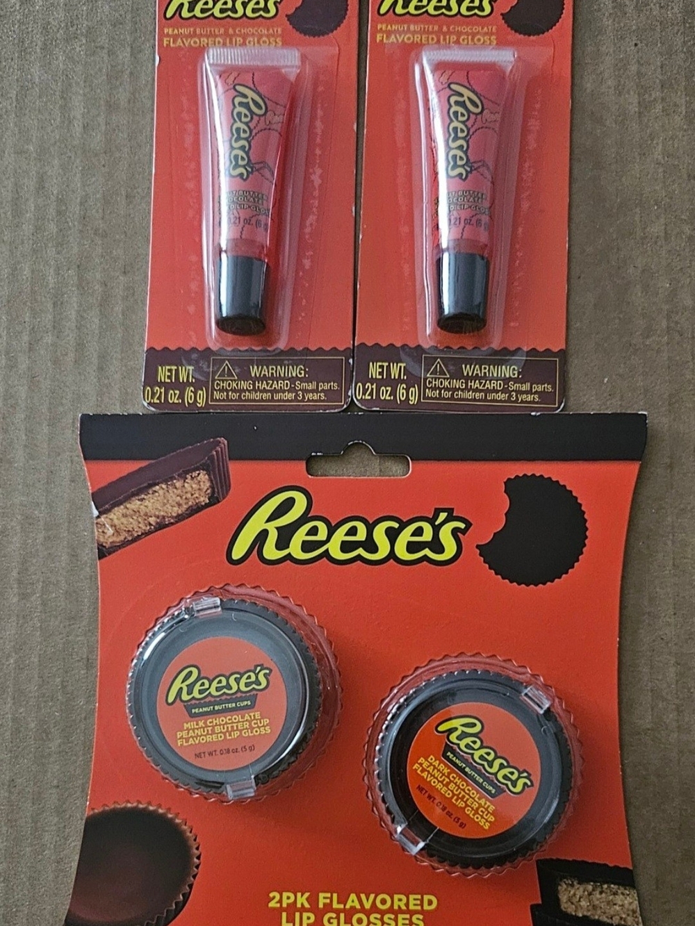 Reese's Peanut Butter Cup Flavored Lip Glosses - Orange & Brown Packaging